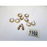 A mixed lot of gold earrings