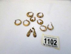 A mixed lot of gold earrings