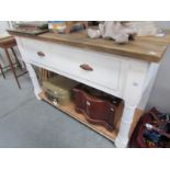 A rustic painted pine dresser base