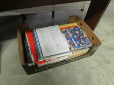 A box of scrap books etc