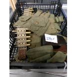 A box of militaria including webbing,