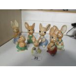 A collection of 7 Carlton ware figurines