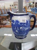 A blue and white jug