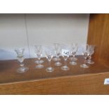 A quantity of small liquer glasses