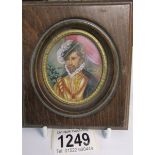 A hand painted miniature portrait of an Italian gentleman