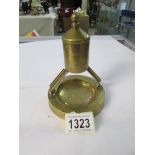 A circa 1890 brass table lighter,