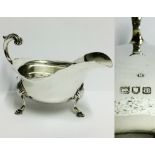 A silver sauce boat hall marked London 1899