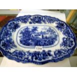 A large 19th century blue and white platter,