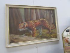 A framed picture of a leopard