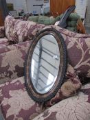 A Victorian oval bevel edged mirror a/f
