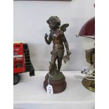 A late 19th century spelter figure of a cherub/messenger