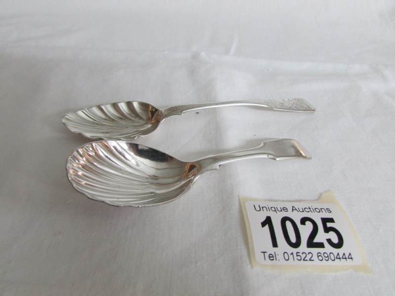 A silver plated spoon spoon and a continental spoon