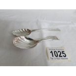 A silver plated spoon spoon and a continental spoon