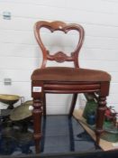 A mahogany dining chair