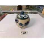 A Macintyre Florian ware lidded pot, Reg. No. 401753.