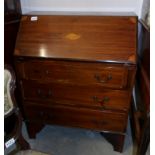 A mahogany inlaid bureau