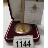 A Queen Elizabeth II golden jubilee Alderney gold proof piedmont five pound coin,