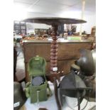 A mahogany tripod table with barley twist column