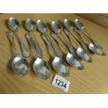 12 silver dessert spoons, hall marked Sheffield 1908, maker H A,