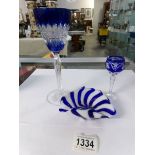 A blue and white glass bowl together with 2 wine goblets
