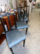 A set of 4 ebonised chairs