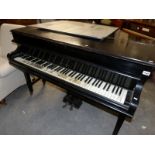 A Challen baby grand piano