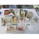 A quantity of cigarette cards including some sets