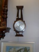 An oak art deco barometer