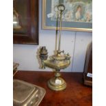 A 19ct Wilde & Wessel brass adjustable oil lamp