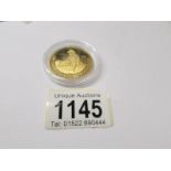 An Englehard USA 1980 24 karat 1oz gold prospector coin