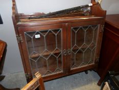 A lead glazed cabinet