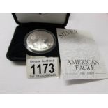 A 2003 American eagle silver 1oz Liberty dollar