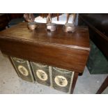 An oak drop leaf table