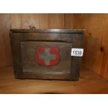 A vintage first aid box and contents