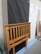 A single divan bed with headboard