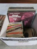 A box of LP and 45 rpm records
