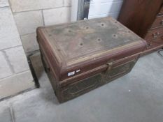 A tin trunk