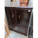 A mahogany TV cabinet