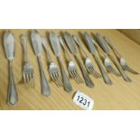 A set of 6 silver fish knives and forks, hall marked Sheffield 1957, maker H A,