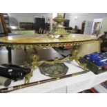 A gilded marble top coffee table