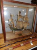 A cased model of a galleon