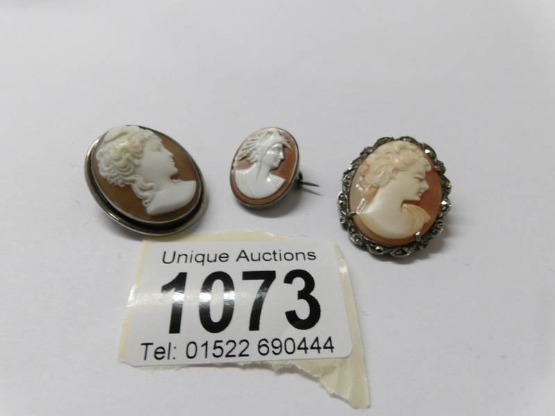 3 silver brooches set cameos