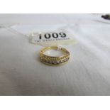 A 9ct gold ring set 9 diamonds,