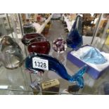 A quantity of glass paperweights