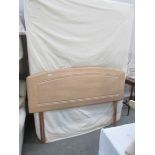 A double drawer divan with mattress and head board