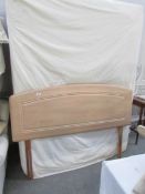 A double drawer divan with mattress and head board