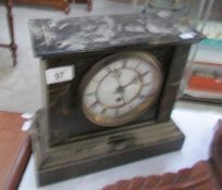 A black mantel clock