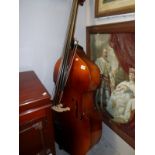 A Boosey & Hawks double bass with bow (Student Model)
