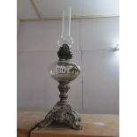 A 19th century oil lamp with spelter base