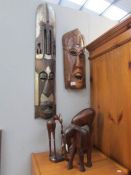 2 wooden tribal masks,